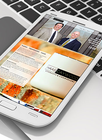Haas Caywood law firm website on mobile phone.