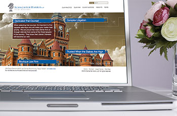 Picture of Home page of Schachter & Harris law firm website on laptop computer.