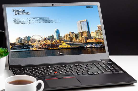 Laptop view of Henke Bartram website.