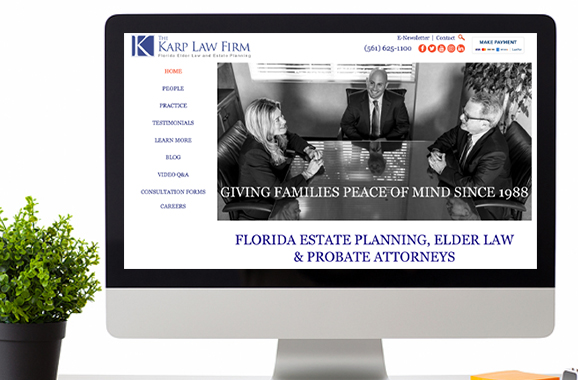 Large monitor view of Karp Law Firm website.