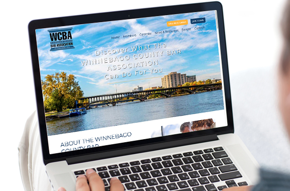 Laptop view of WCBA website.